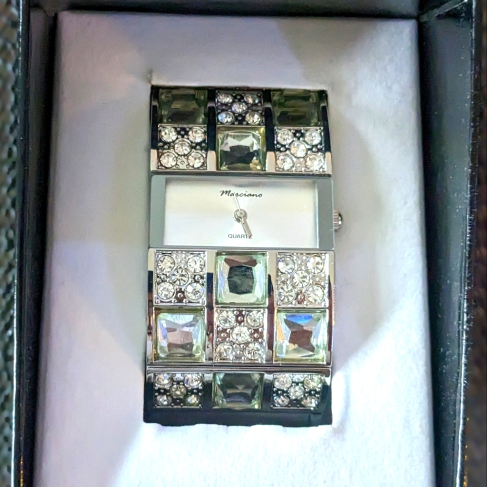 Silver and jewel watch